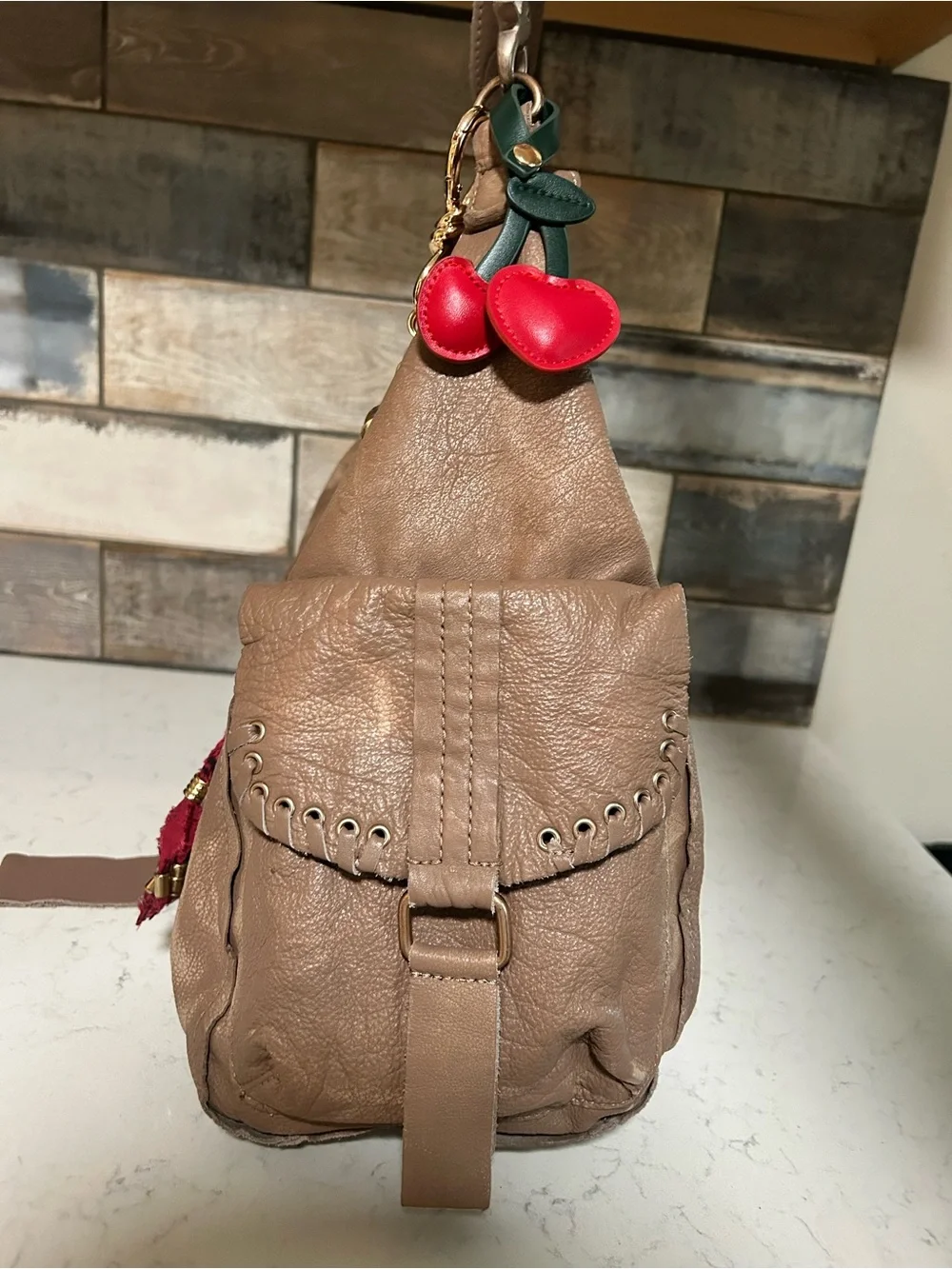 LIKE NEW We The Free Leigh Hobo Distressed Leather Tote in Saddle With Charms